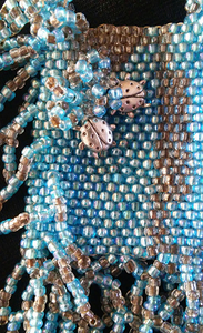 Beaded Amulet Bag with tiny ladybug charms